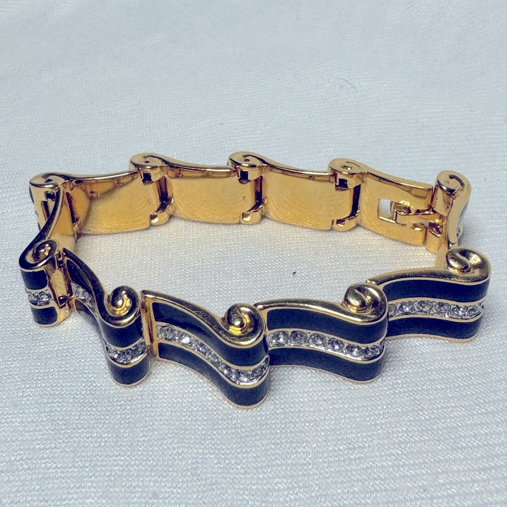 Swarovski 🤩HOST PICK 🤩gold bracelet with black enamel and crystal accents USED